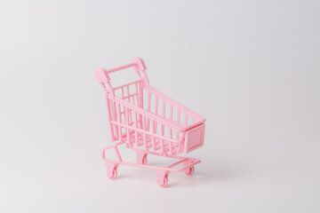 Shopping cart over white background