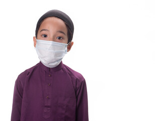 A Muslim kid with various poses isolated over white