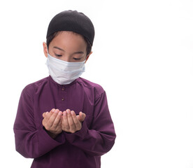 A Muslim kid with various poses isolated over white