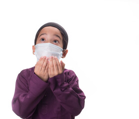 A Muslim kid with various poses isolated over white