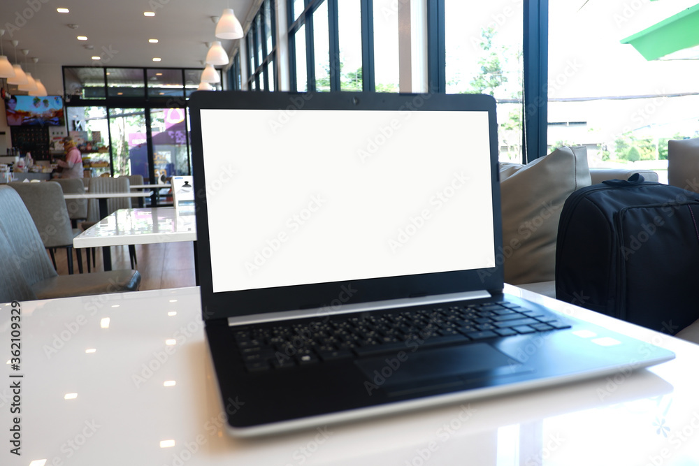 Fototapete Cropped shot view of the labtop with blank copy space screen for your information content or text message.