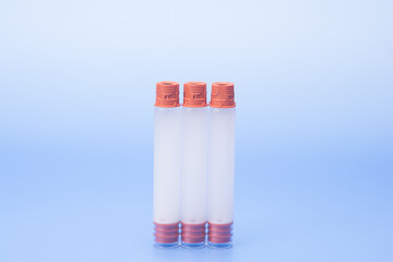 Insulin pen isolated over blue background