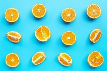 High vitamin C, Juicy and sweet. Fresh orange fruit  on blue background.