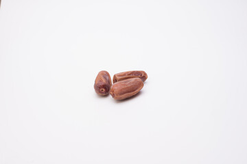 Dry dates over white background