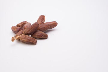Dry dates over white background
