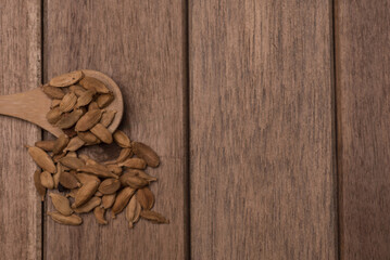 Cardamom herbs,over wooden background