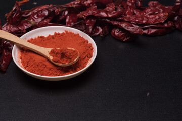 Chili powder over dark surface