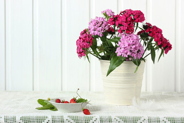 bouquet with Turkish carnation  and garden strawberries