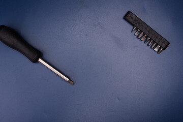 Screwdriver bits on a blue background