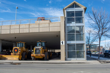 Snow Removal Machinery Parked in City Parkade