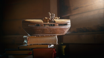 Story of Noah's Ark adventure on the Bible and History books, Wood carving doll, christian concept.