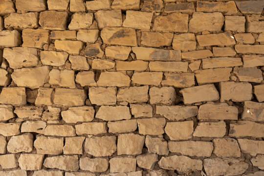 Old pioneer built sandstone wall