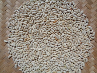 Long bean seeds with a natural background. The seeds are on drying process