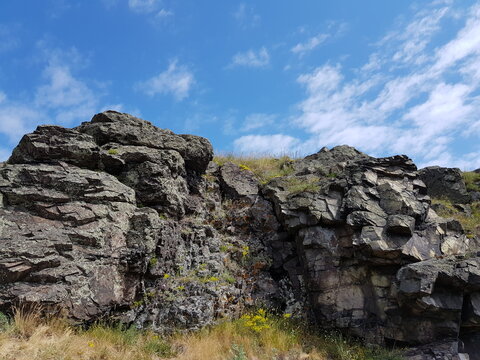 Stone rocks against the blue sky