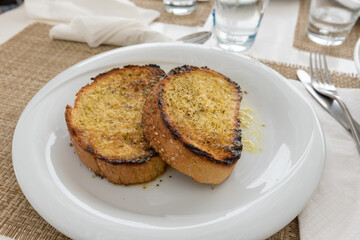 Bread toasted with garlic and oil