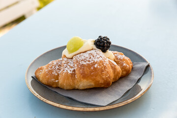 Creamy croissant with berries