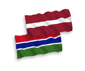 Flags of Latvia and Republic of Gambia on a white background