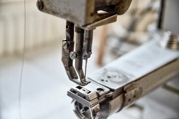 Sewing machine for leather. Detail. Closeup shot.