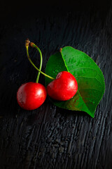 cherry on a wooden background red food