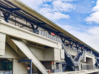 Architecture construction of elevator, escalator stairs and sky walk way, walk bridge between sky train station and department store mall