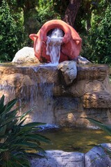Fototapeta na wymiar Water fountain in the garden