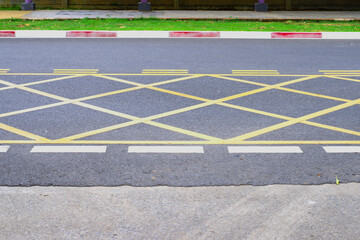 Fototapeta premium No Parking Yellow Cross Zone Sign On The Road
