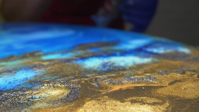 super close up. the process of making panels of epoxy resin, handmade