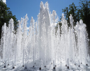 fountain on a hot sunny day against the blue sky