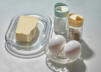 Few ingredients for preparing simple fried eggs