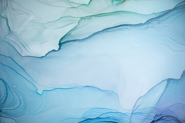 Alcohol ink sea texture. Artistic bright splash. Liquid artwork. Abstract ethereal swirl. Fragment of artwork. Trendy modern art. Inspired by the sky, as well as steam and smoke.