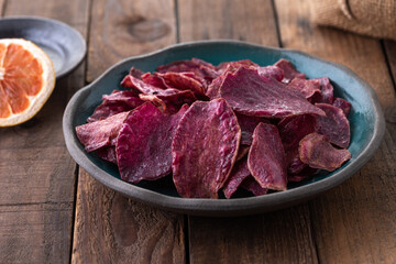 slice purple sweet potato fire on wood