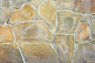 masonry wall paving stones as a background	
