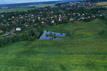 amazingly beautiful nature with a river at dawn taken from a drone