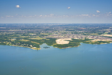 Aerial view of Lavon Lake, Texas, USA. Fresh water reservoir, located in Collin County, part of the Dallas-Fort Worth-Arlington, Texas Metropolitan Area. City of Lucas, suburban residential area.