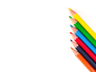 Fototapeta premium colored pencils on white background