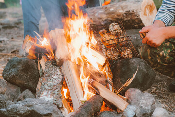 cooking on a campfire in nature. rest from the city bustle in a campsite