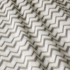 Pattern on beige fabric in zigzag. Fabric with natural texture, Cloth backdrop.