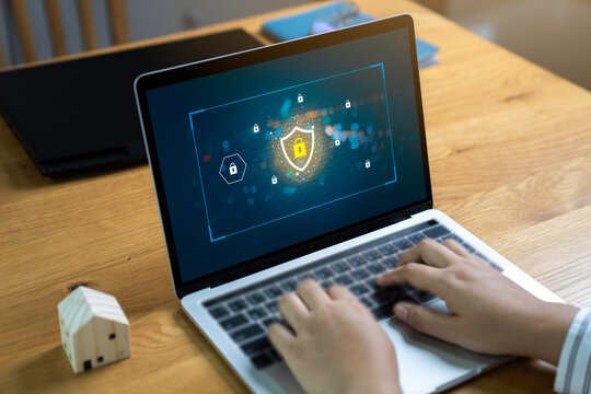 Person using a Laptop Computer with data protection, Cyber security, information safety and encryption concept. internet technology and business concept, Laptop mockup with clipping path.