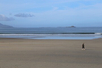 The near deserted Banna beach, County Kerry, with the Dingle Peninsula, in the background, Ireland.