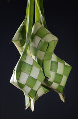 Ketupat, it is a traditional rice cake often seen during the Eid Holiday or other Indonesian Islam Holiday.