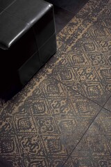 Modern design of room with floral black and yellow tiles, luxurious interior background. © Fran Antolini