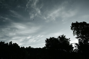 drone against the background of the morning sky removes the rising of the sun