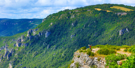 Fototapeta na wymiar View of the Gorges du Tarn, in France- woman hiking mountain