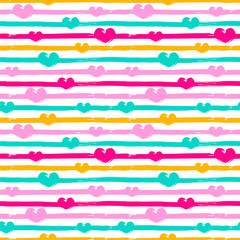 Seamless pattern with stripes and hearts in vivid colors.