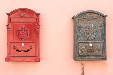 Vintage mailboxes on the wall of a house in Israel