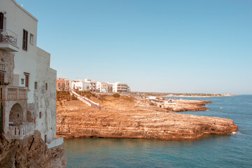 Summer in Polignano a mare. View of Puglia' sea, near Bari. Panoramic view of sea polignano a mare, a city in Puglia ( apulia) during a sunny day.  It is a very perfect turist destination in the summe