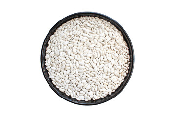 White beans in the black pan on white background