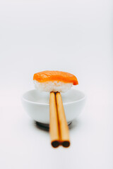 Stock photography japanese salmon nigiri sushi with chopsticks and soy sauce boul