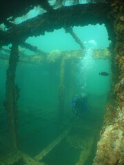 scuba diver underwater ship wreck caribbean island