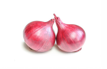 Red organic onion bulbs isolated on white background.